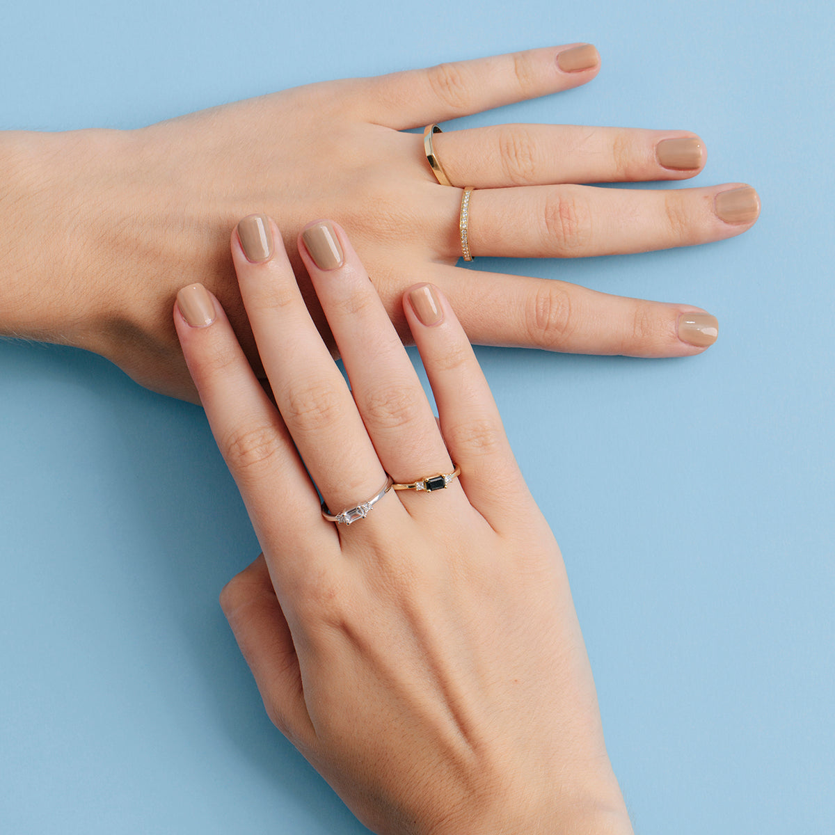 Emerald cut and princess cut diamond ring