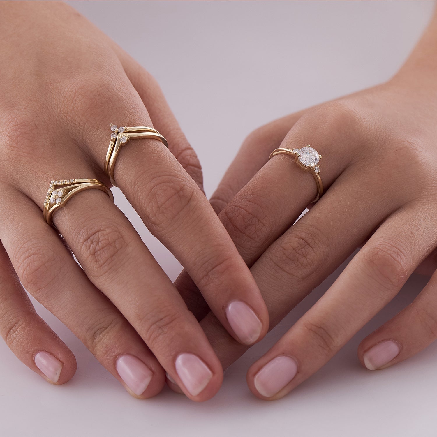 V-shaped gold ring set with 3 diamonds