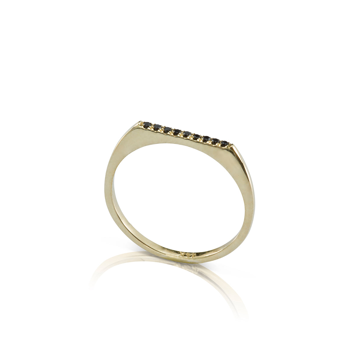 A thin signet ring set with a row of black diamonds