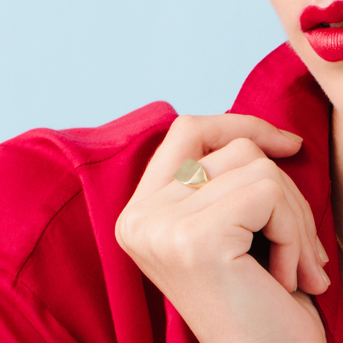 A square signet gold ring