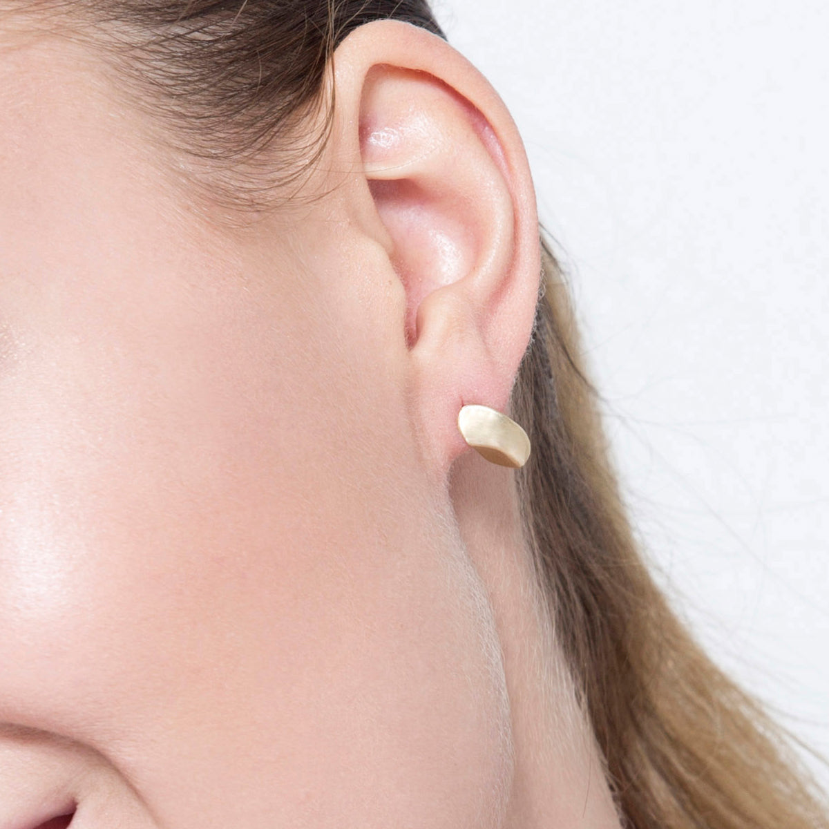 Tight amorphous gold earrings