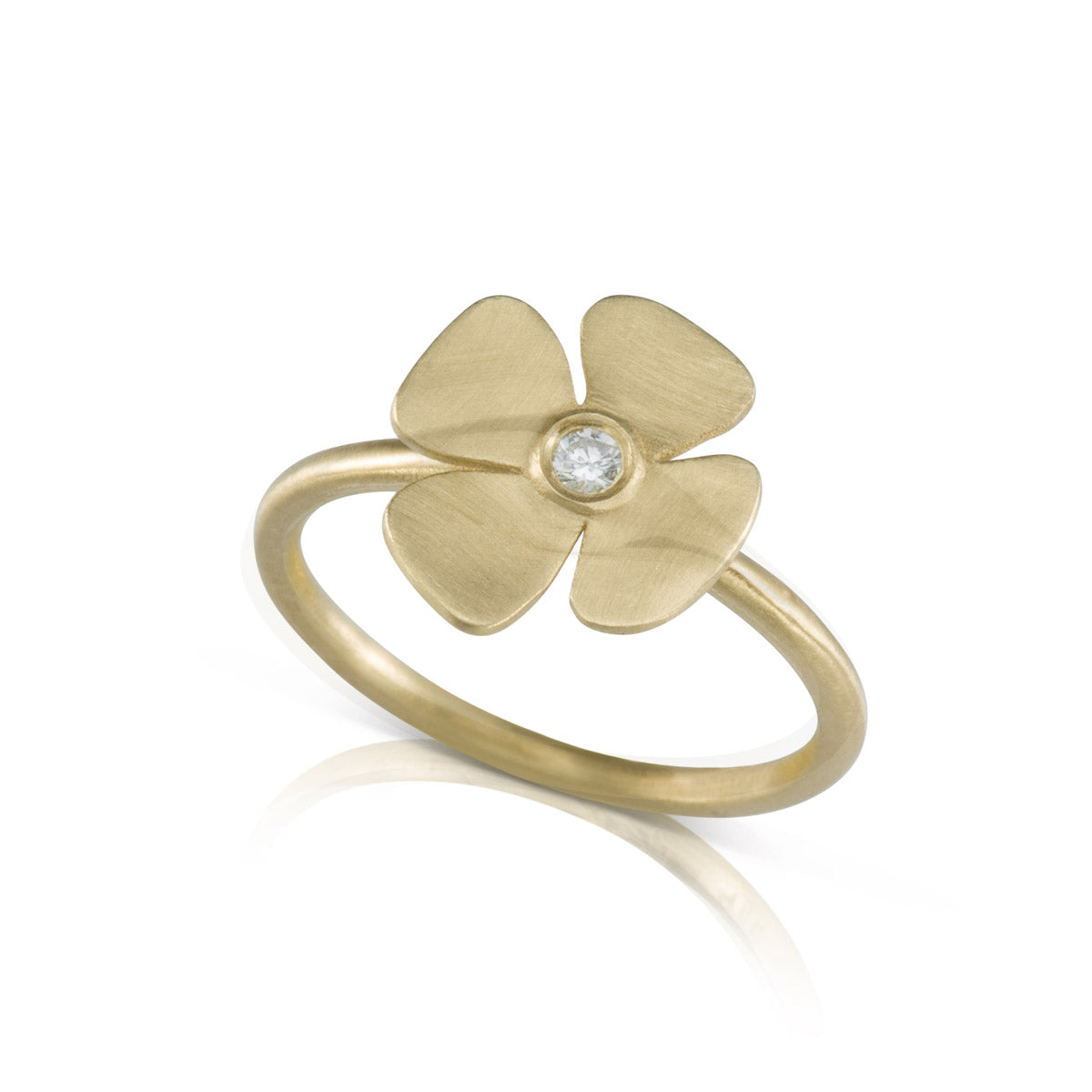 A gold and diamond flower ring with a delicate design