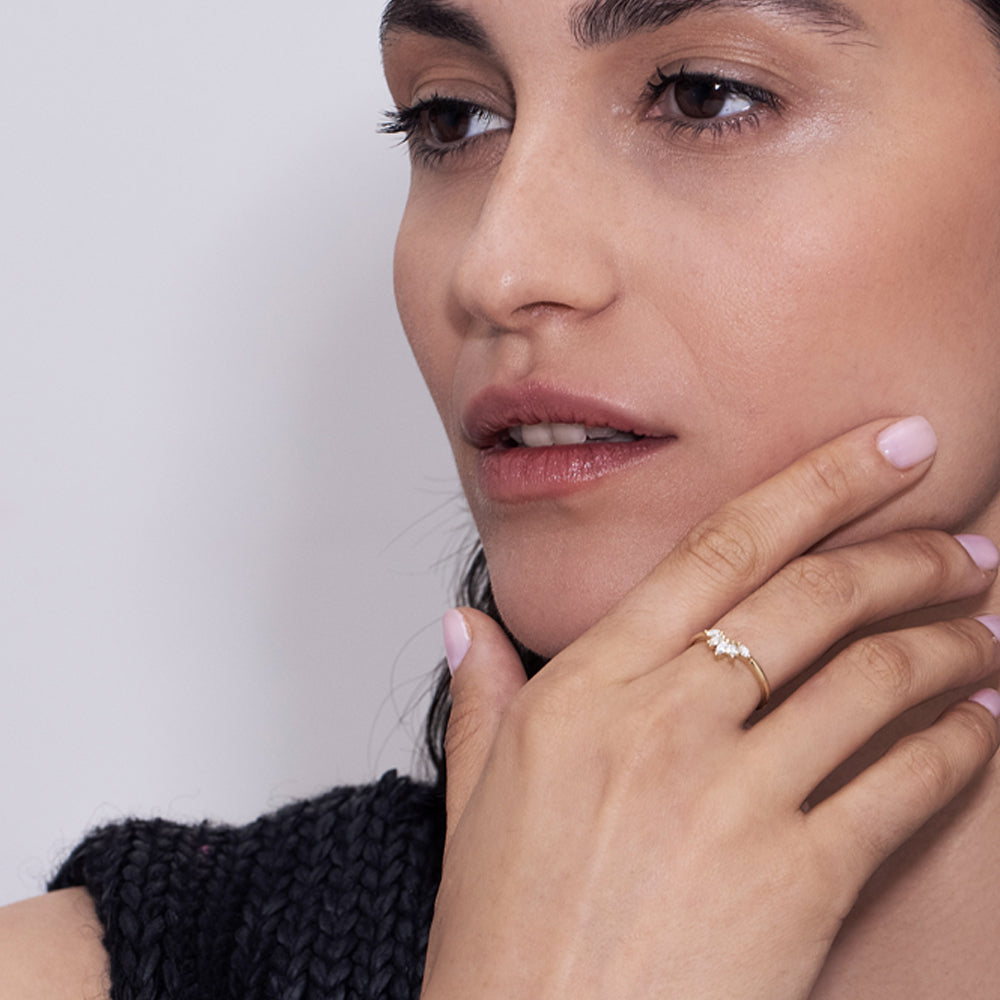 Gold ring set with 5 laboratory marquise diamonds