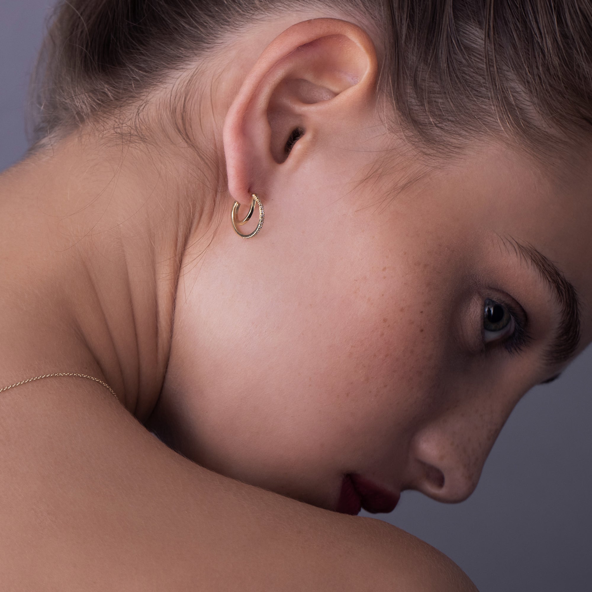 Special double hoop earrings studded with diamonds