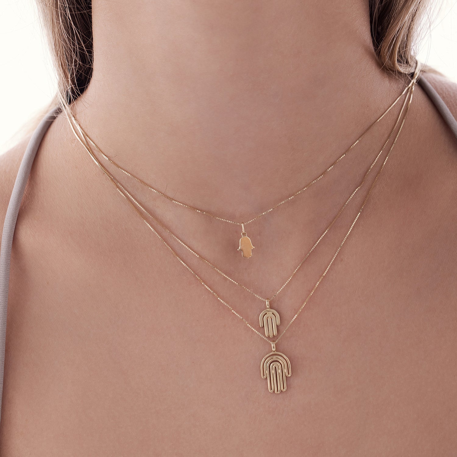 Hamsa gold necklace designed