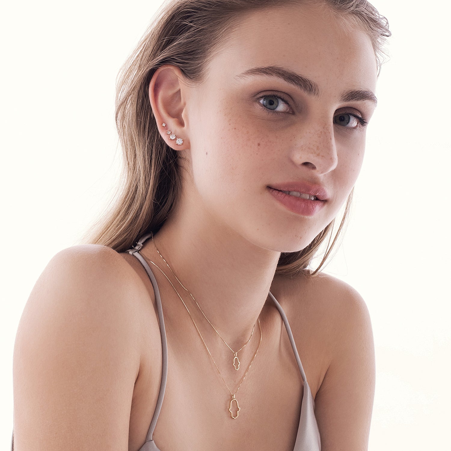 Hamsa gold necklace for women with large outline