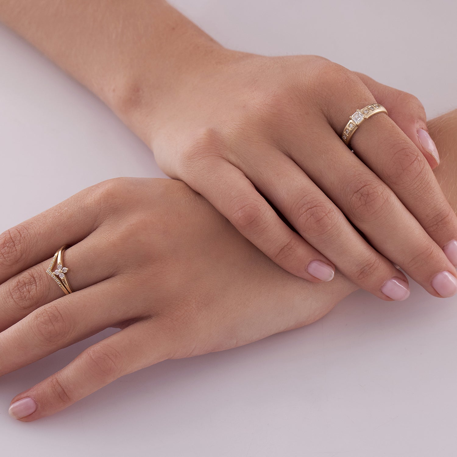 Delicate gold ring with diamonds in the shape of a flower