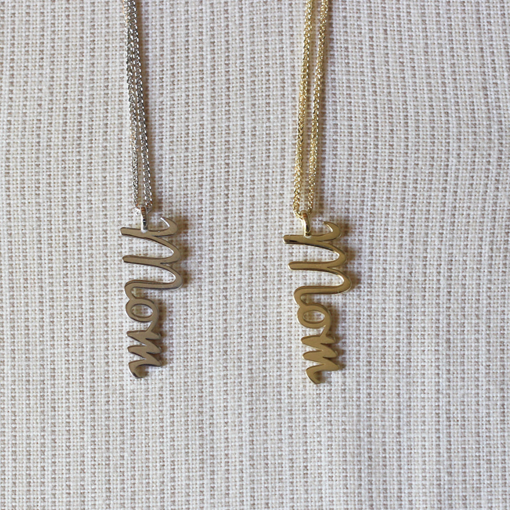 Gold necklace with vertical name pendant