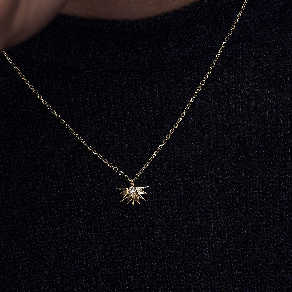 A special gold chain with a large half sun pendant