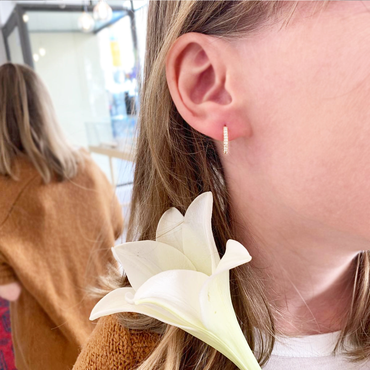 Gold hoop and diamond earrings