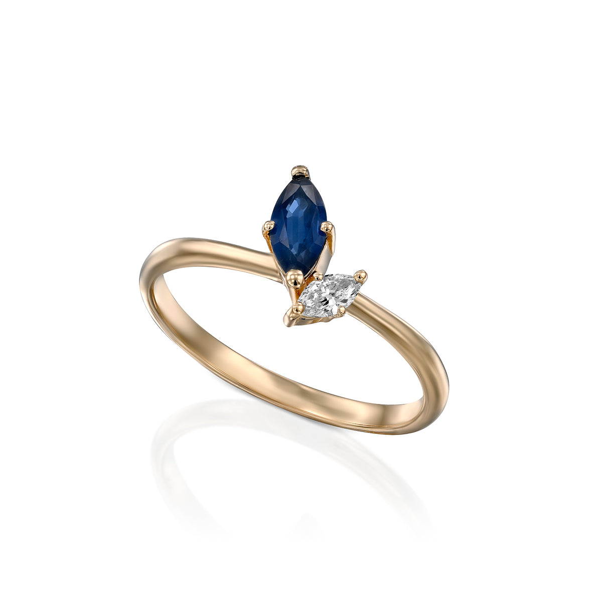 A special gold ring set with a diamond and sapphire in the shape of a marquise
