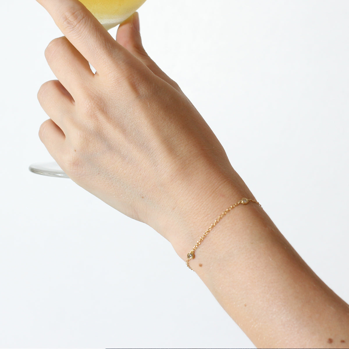 Gold bracelet studded with 4 diamonds