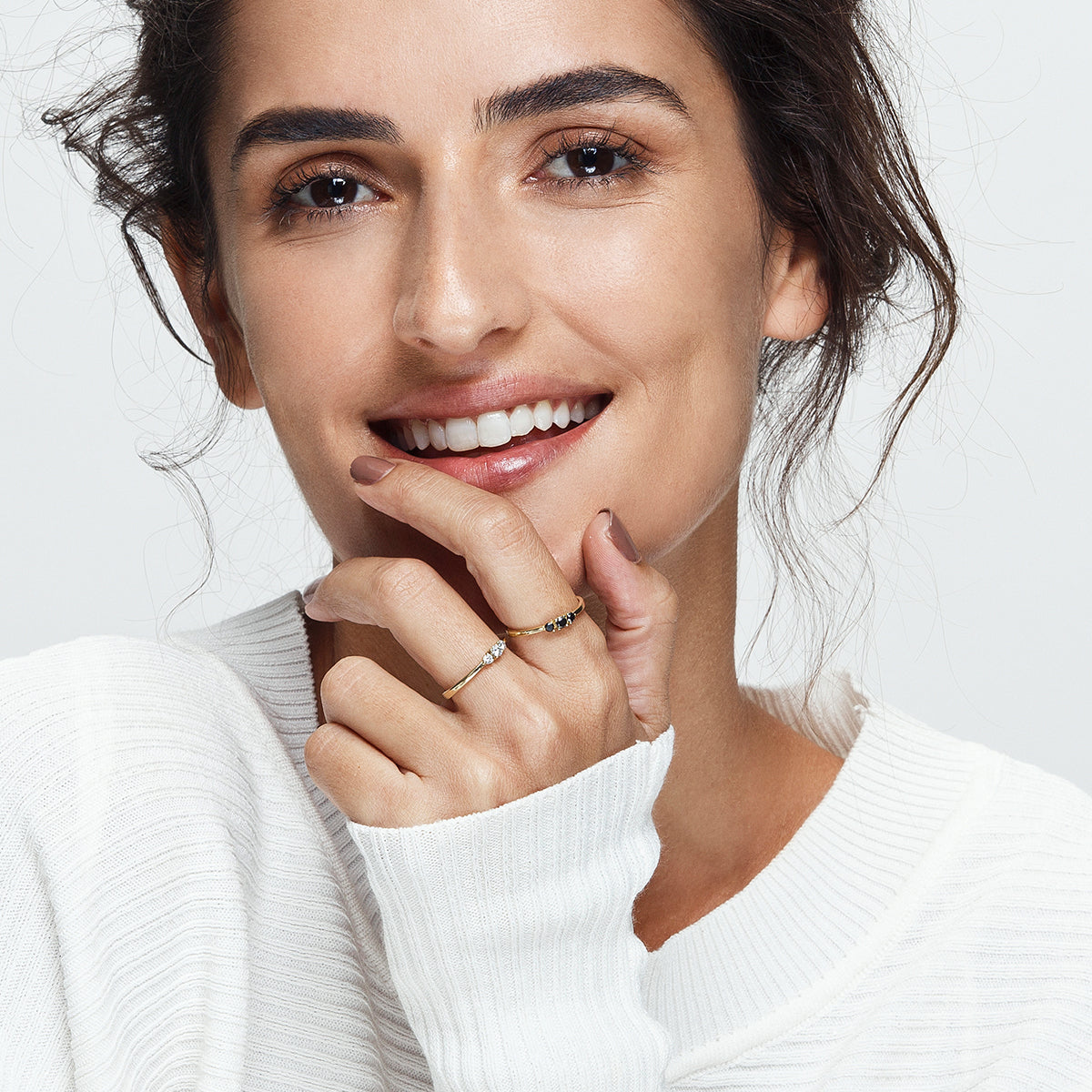 A delicate three diamond ring