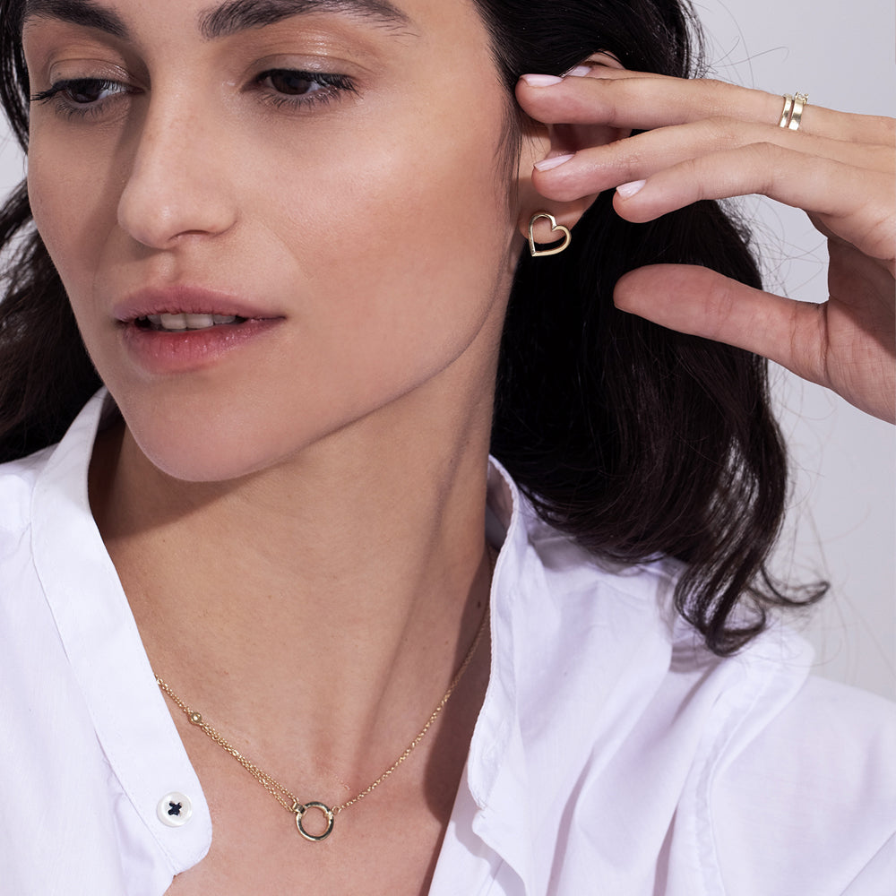 A thick, asymmetric and special gold chain, with a modern and impressive design. Diamond encrusted