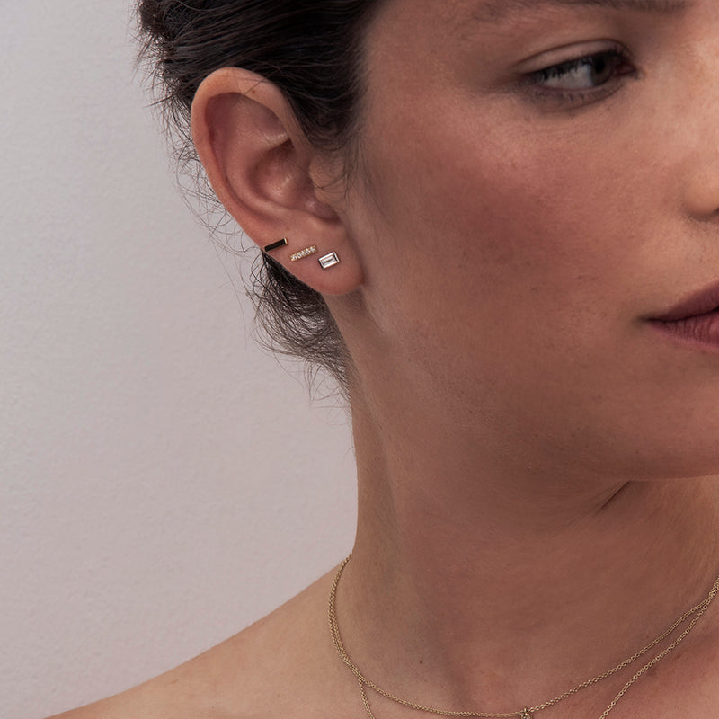 Attached diamond earrings with a frame studded with baguette-cut diamonds 0.20ct