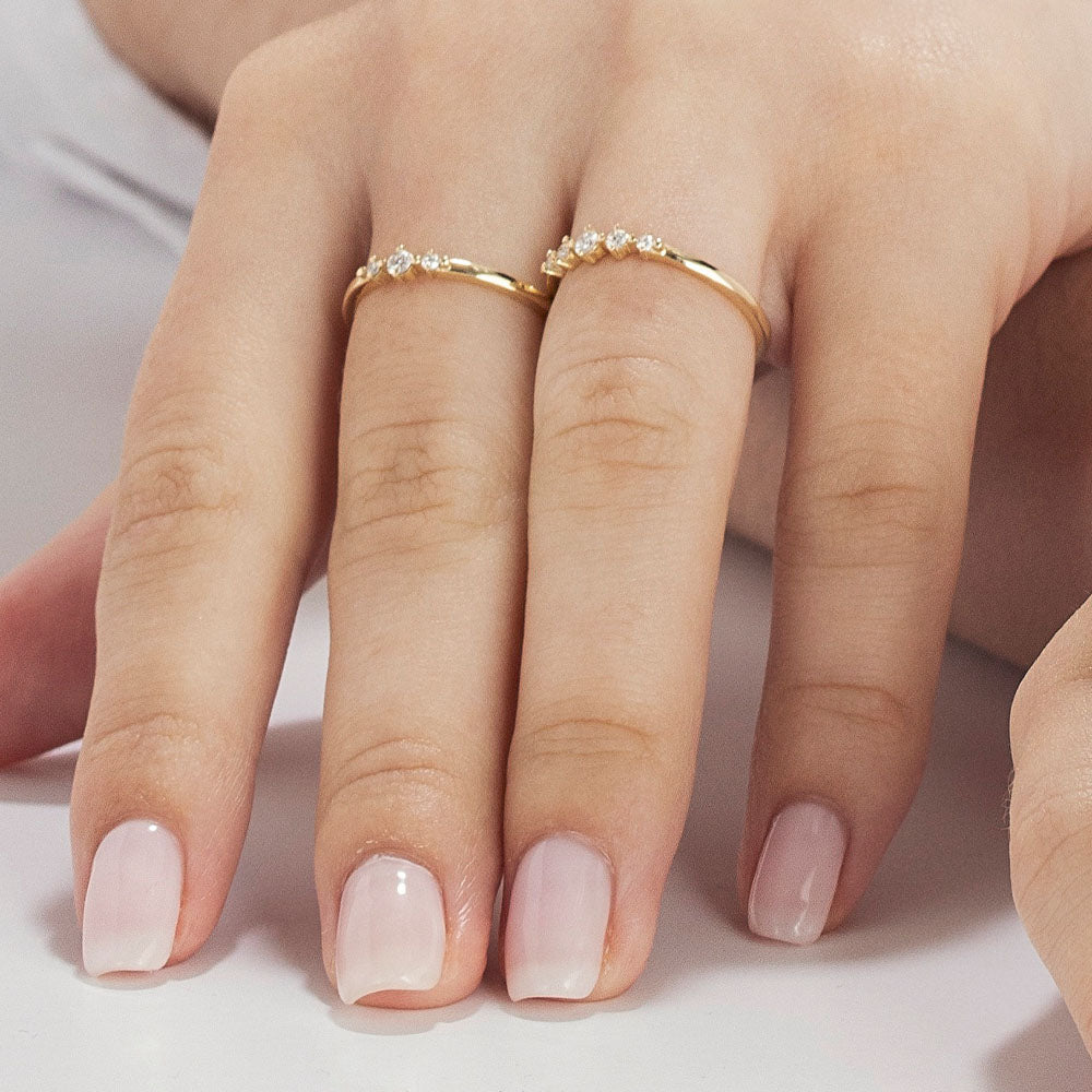 A fine diamond ring set with 3 diamonds in a special setting