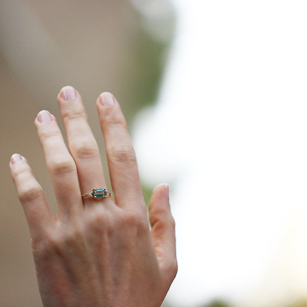 Aquamarine ring and claw-cut diamonds
