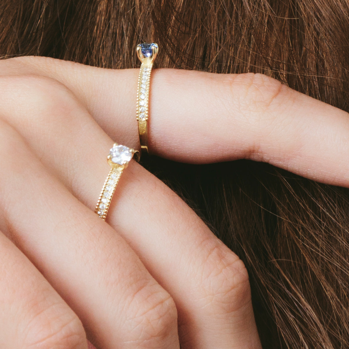 A special solitaire gold ring studded with sapphires