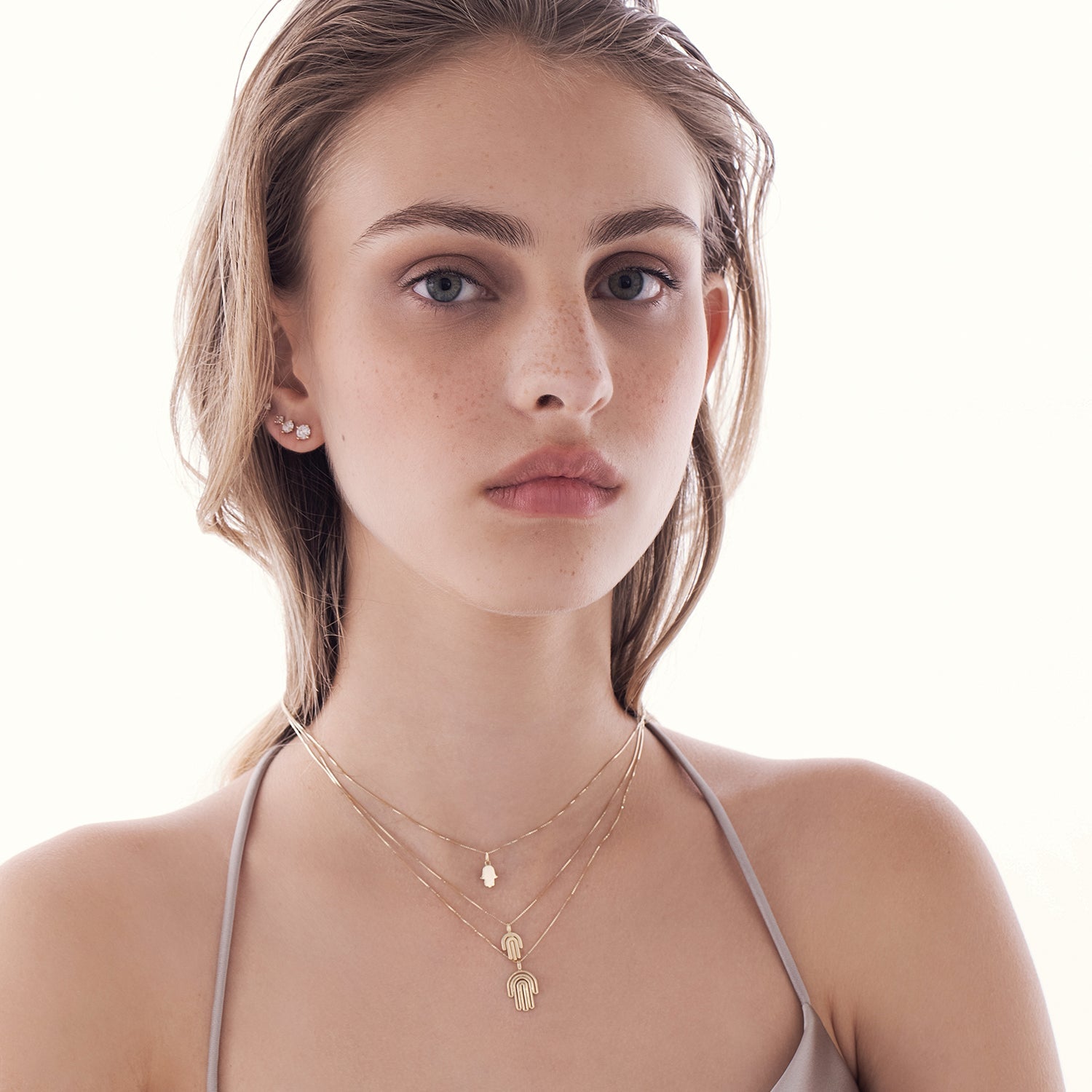 Hamsa gold necklace designed