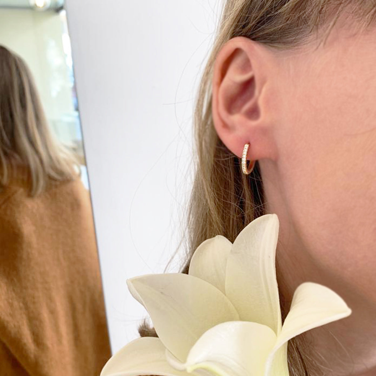 Gold hoop and diamond earrings