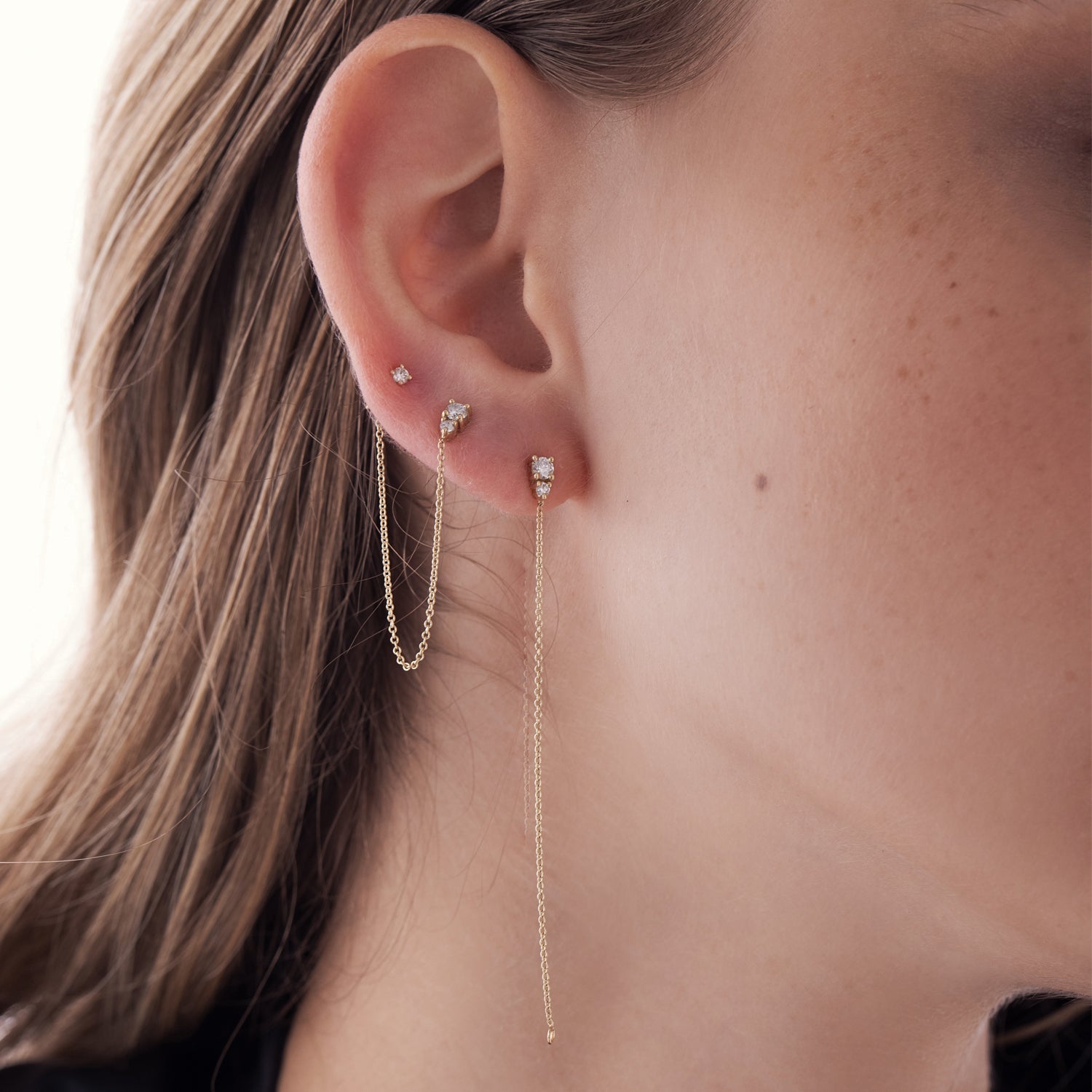 Classic tight solitaire earrings studded with lab diamonds total weight 10 points