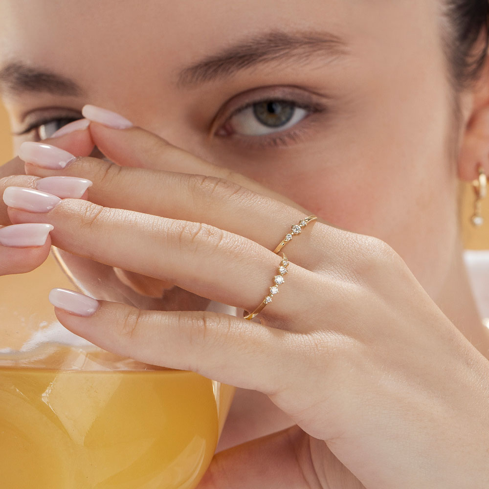 A fine diamond ring set with 3 diamonds in a special setting