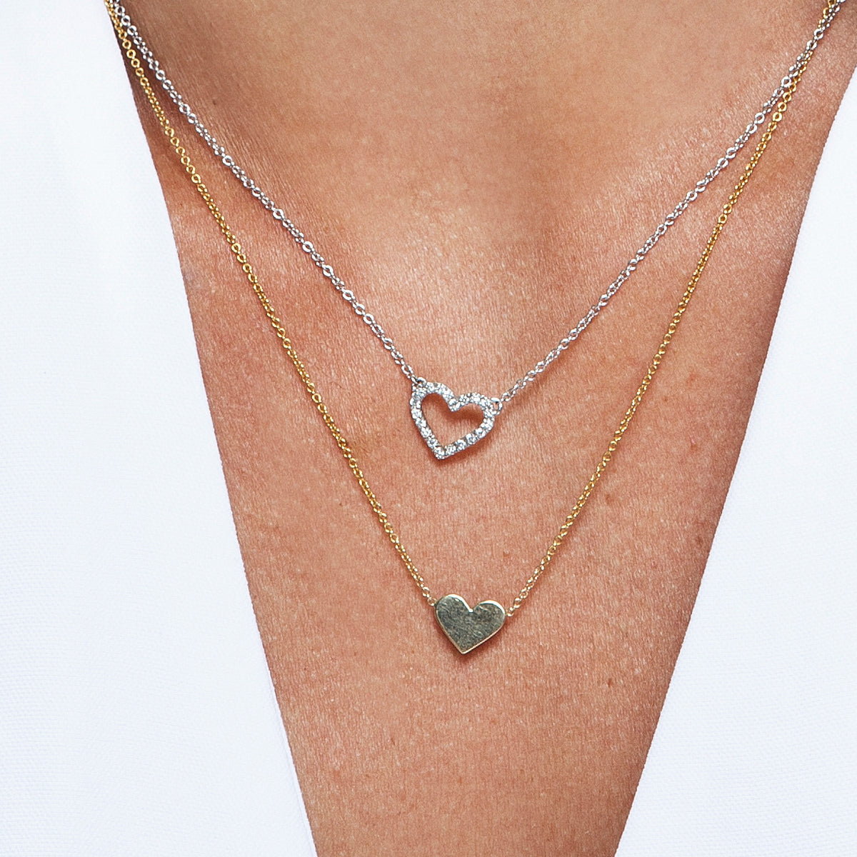Gold necklace with heart pendant