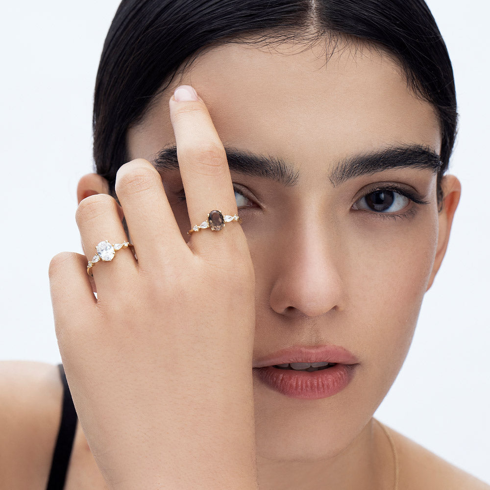 1.00 carat diamond ring combined with drop cut diamonds and round diamonds
