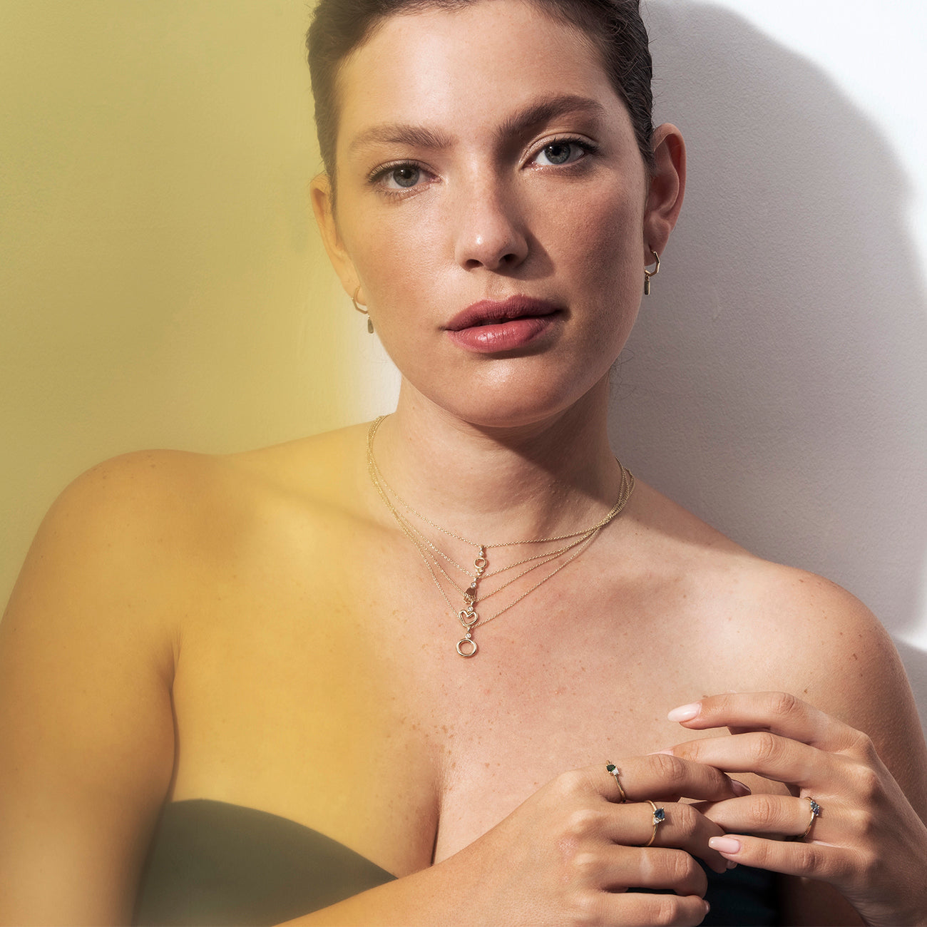 Gold necklace with a delicate heart pendant set with a diamond