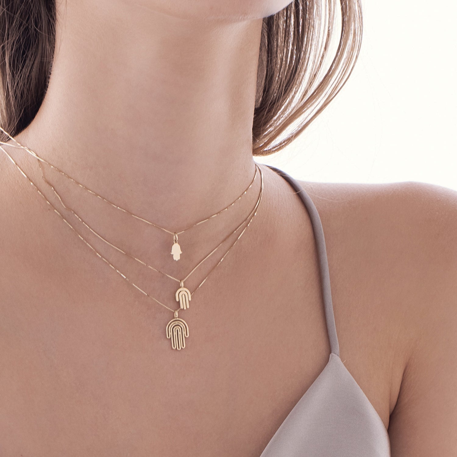 Hamsa gold necklace designed