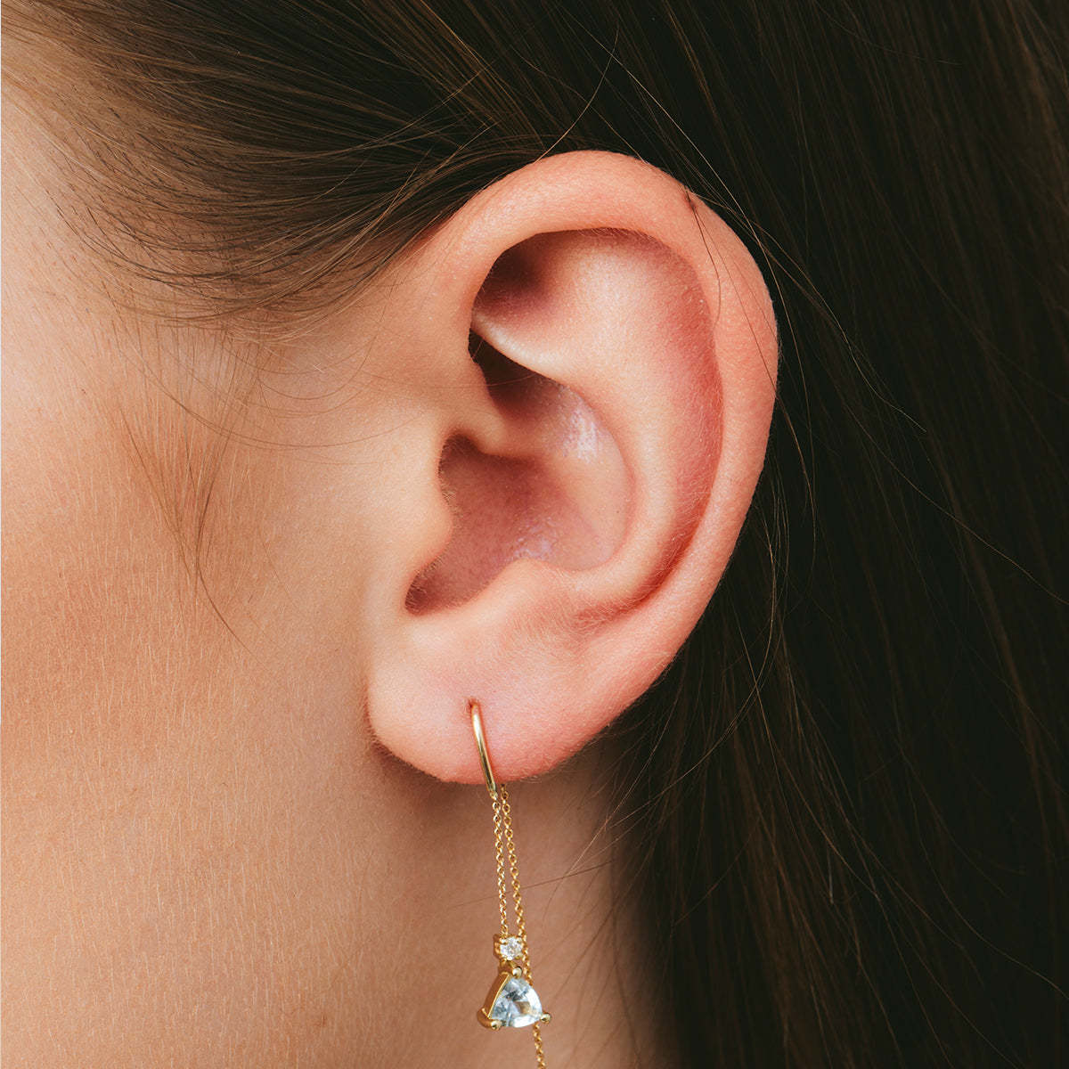 Dangling gold earrings with aquamarine and diamonds