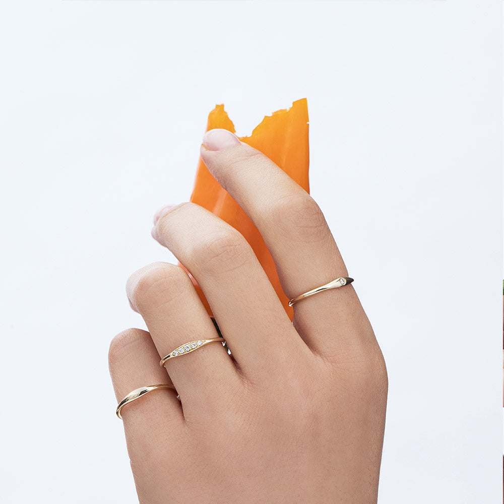 A fine gold ring studded with diamonds