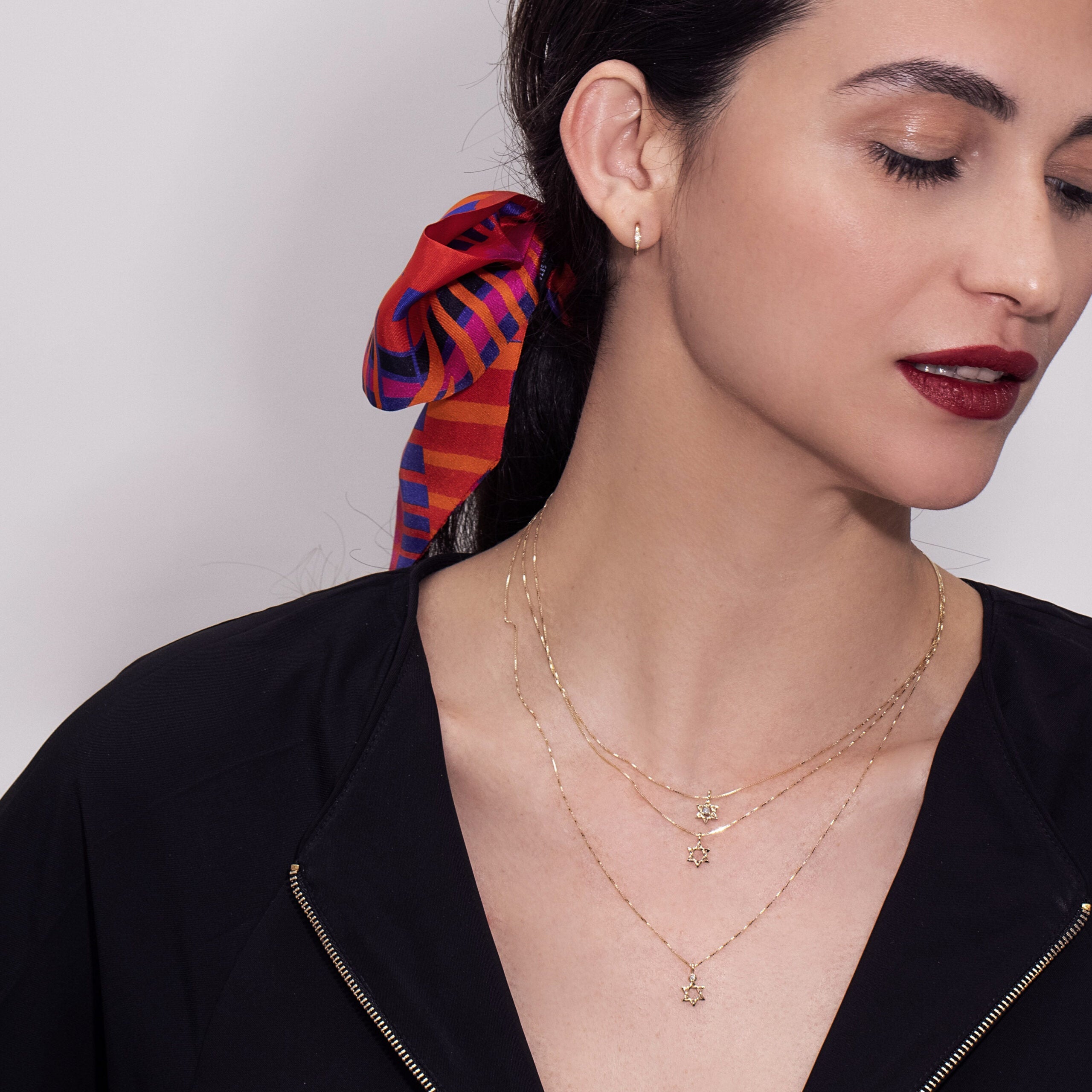 Gold necklace designed with a Star of David pendant set with a diamond, 1.5 points, 14 carat gold