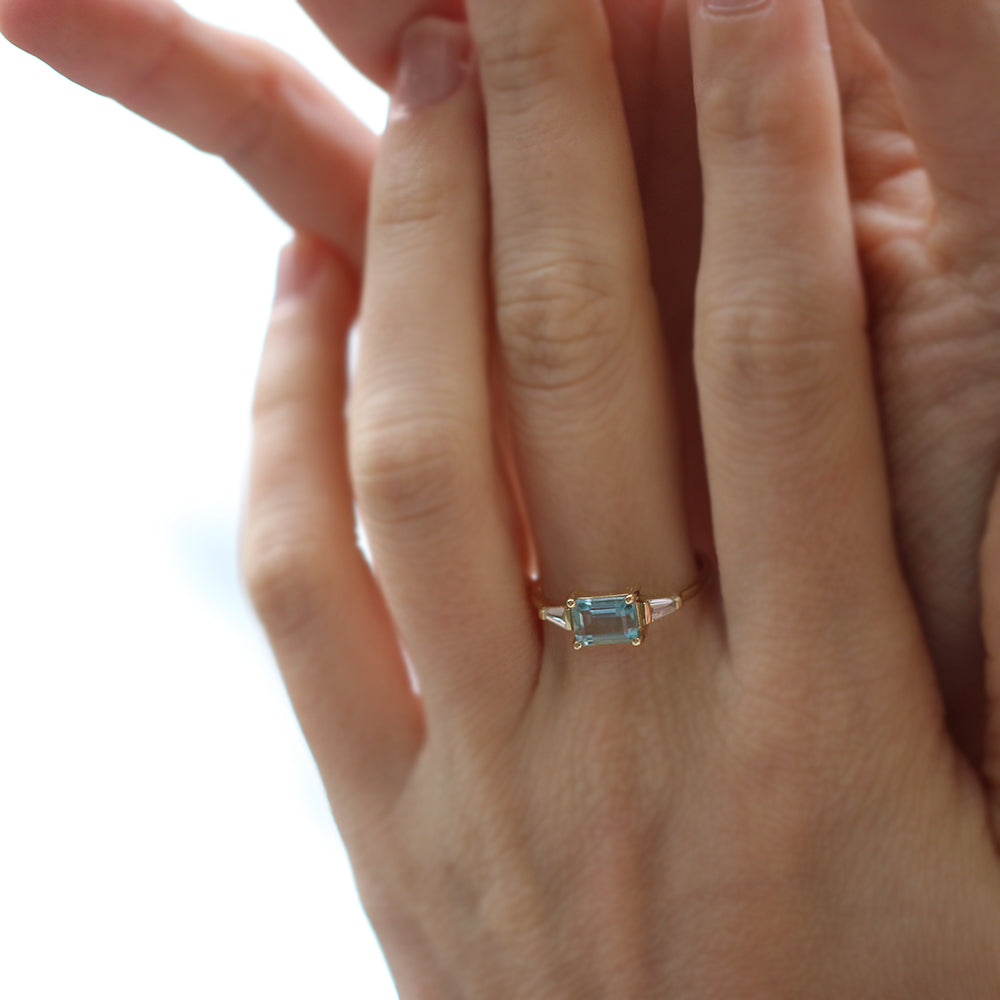 Aquamarine ring and claw-cut diamonds