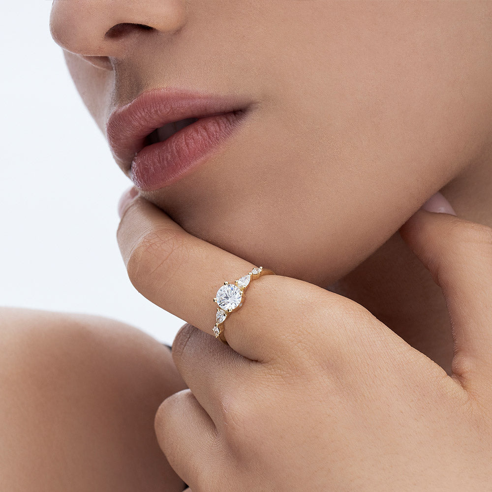 An impressive lab diamond ring with drop and marquise cuts