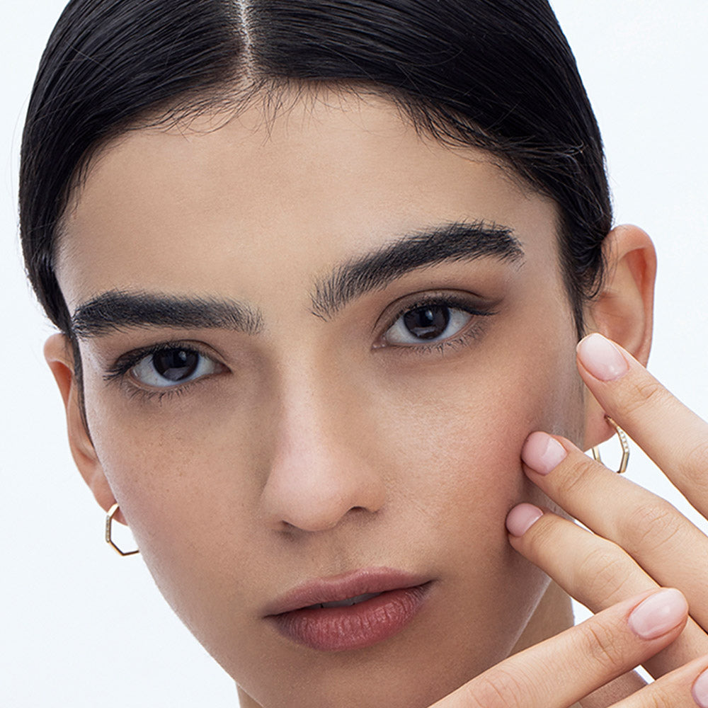 Hexagon geometric hoop earrings studded with diamonds