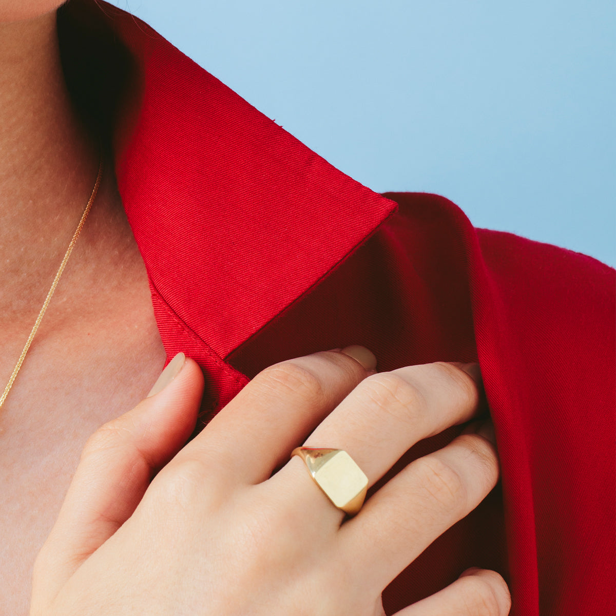 A square signet gold ring