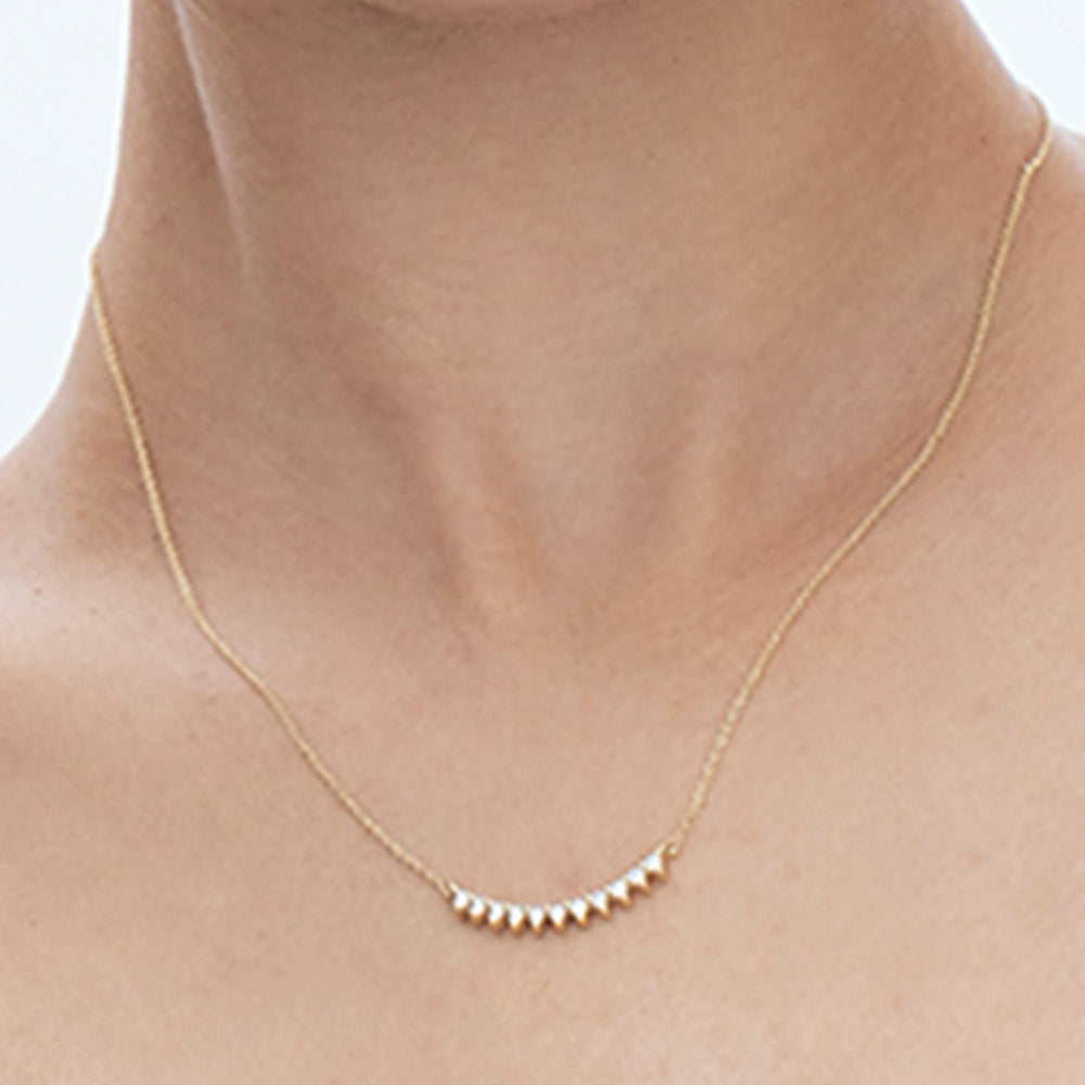 A particularly amazing horizontal white diamond necklace