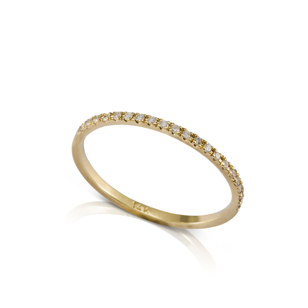A gold ring set with a thin line of diamonds