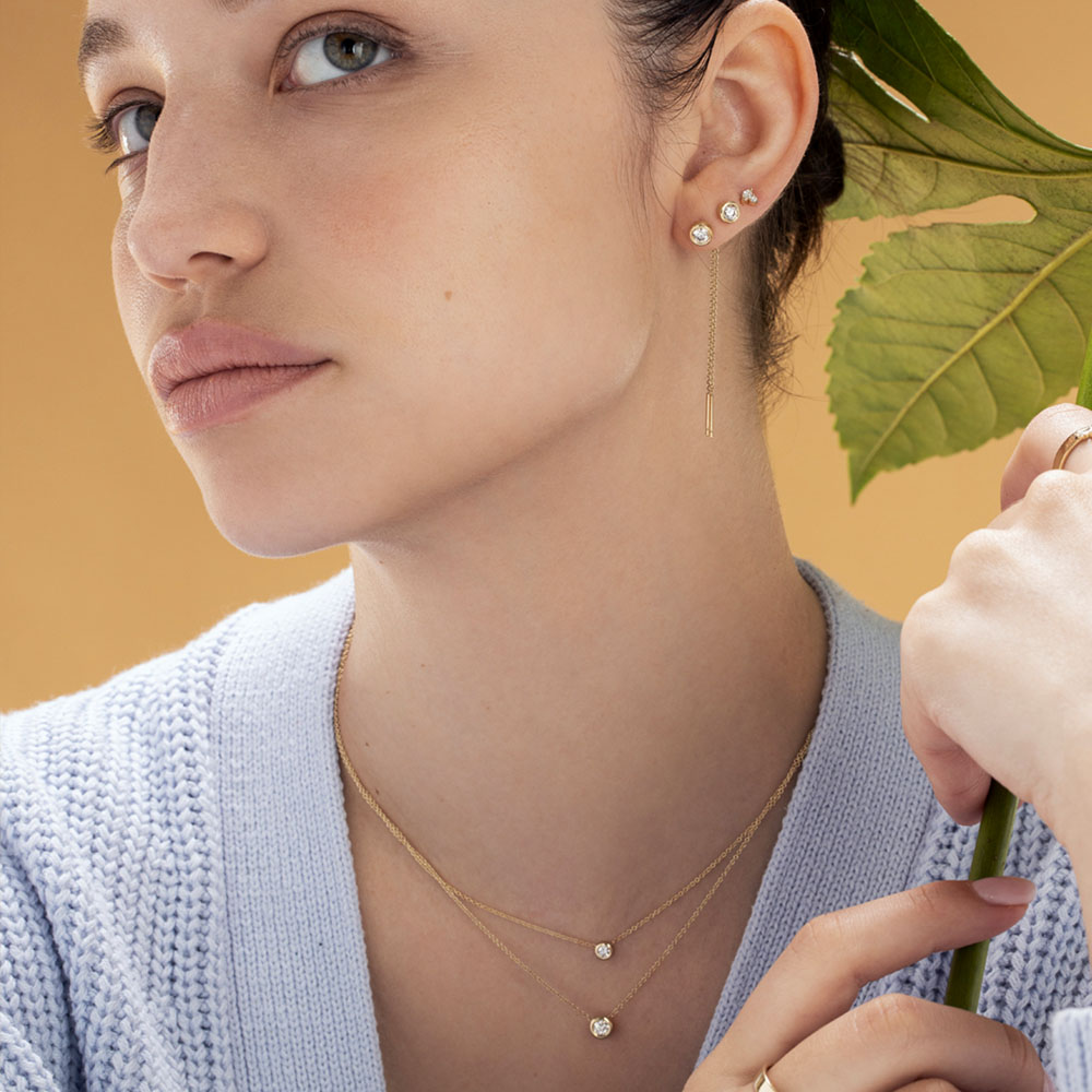 Gold necklace with a 0.20ct cup-set diamond pendant