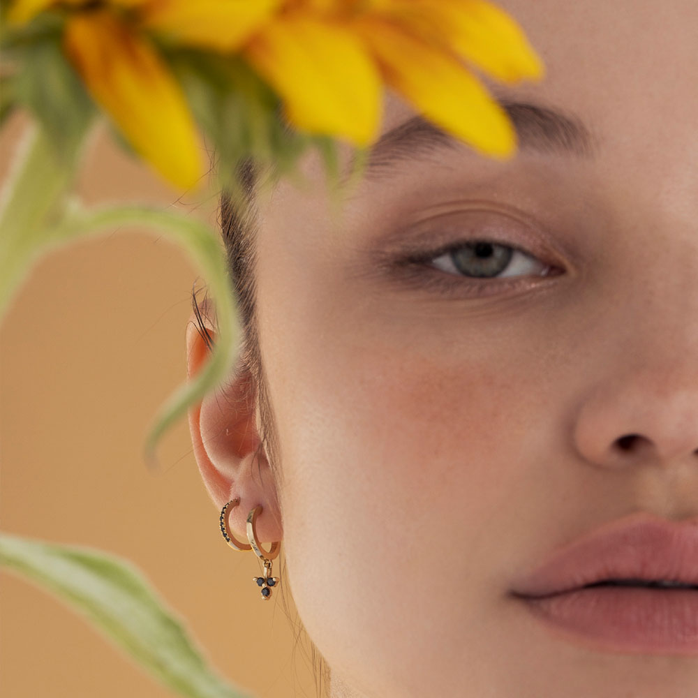 Classic small hoop earrings studded with black diamonds