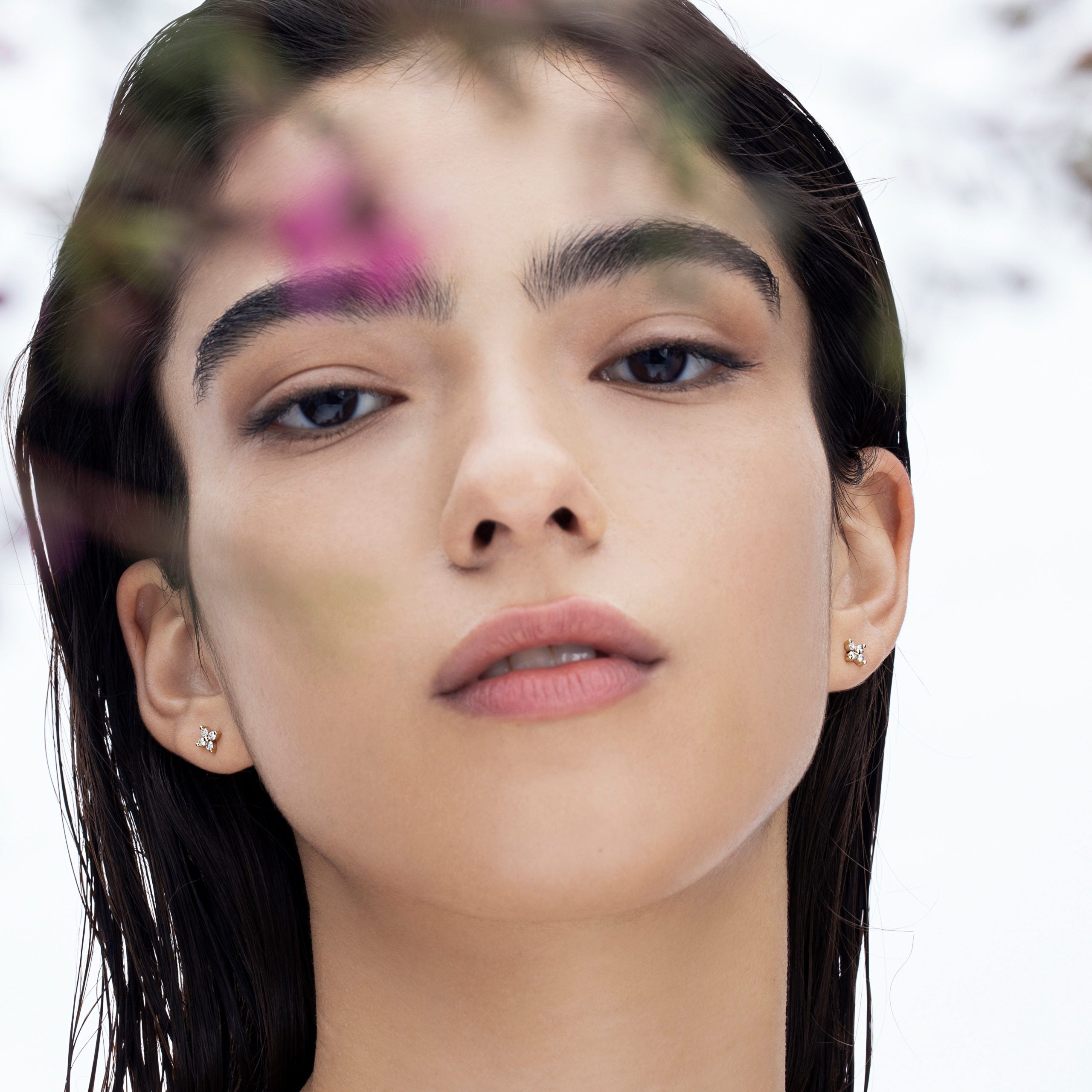 Tight gold earrings studded with 4 diamonds