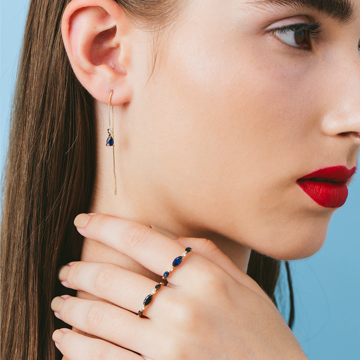 Dangling gold earrings with sapphires and diamonds