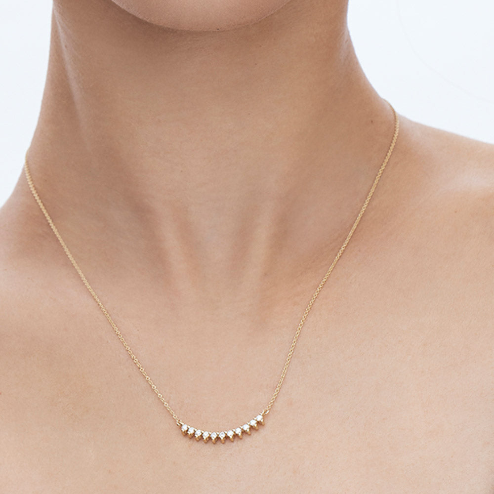 A particularly amazing horizontal white diamond necklace