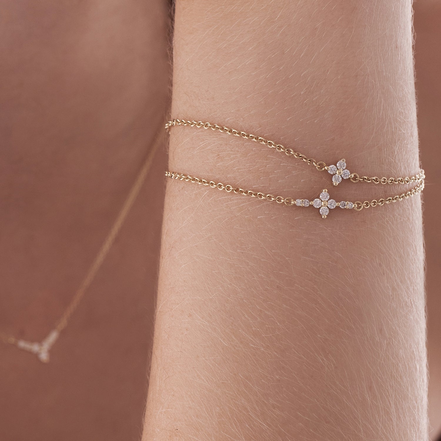 Gold bracelet for women set with 4 diamonds