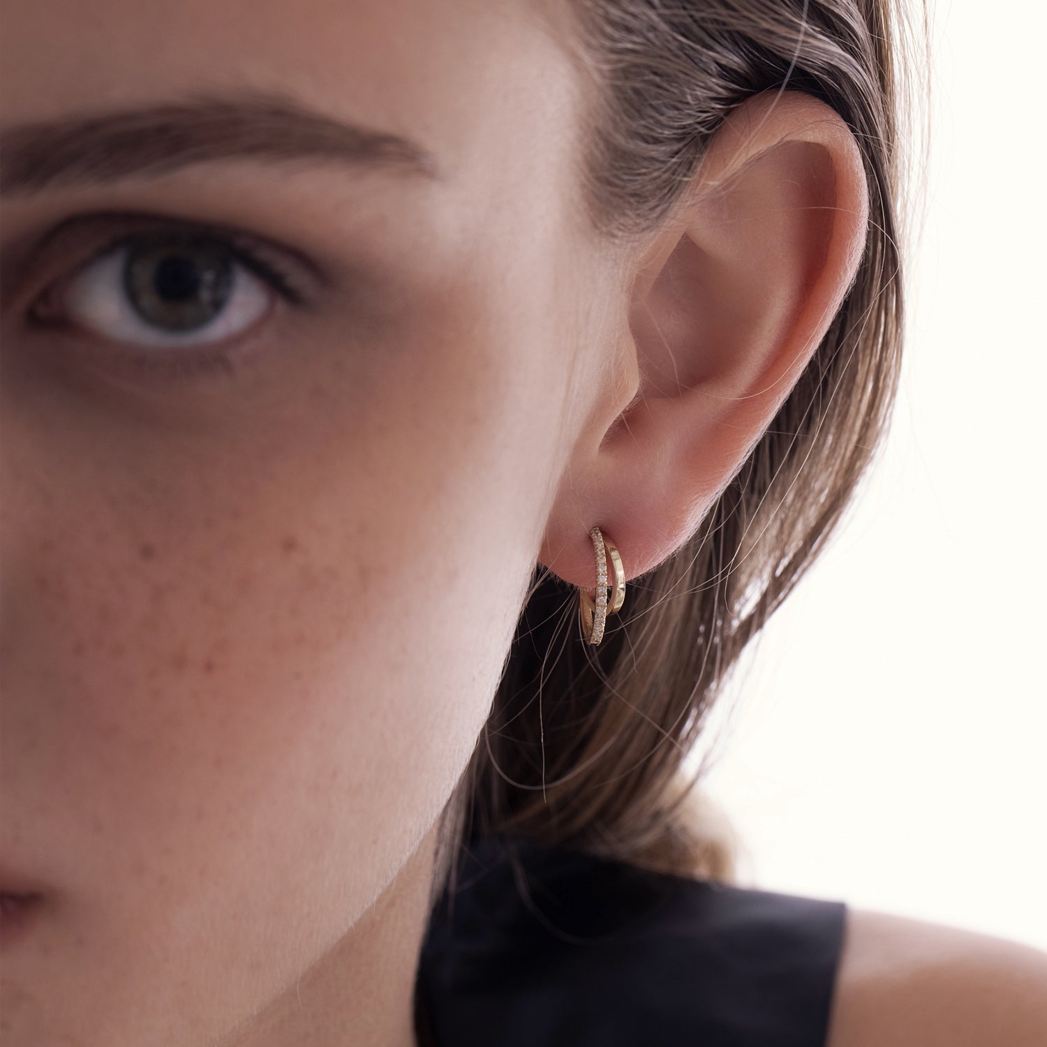 Special double hoop earrings studded with diamonds