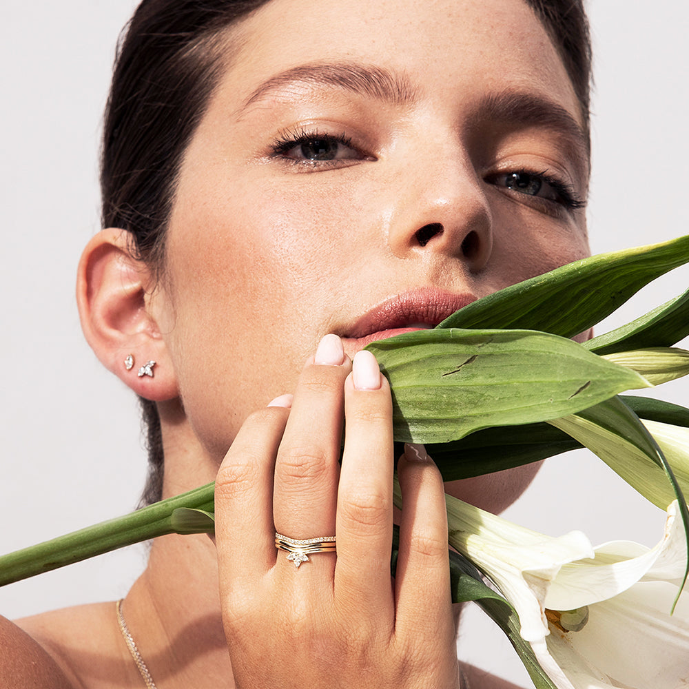 A gold ring with a gentle wave