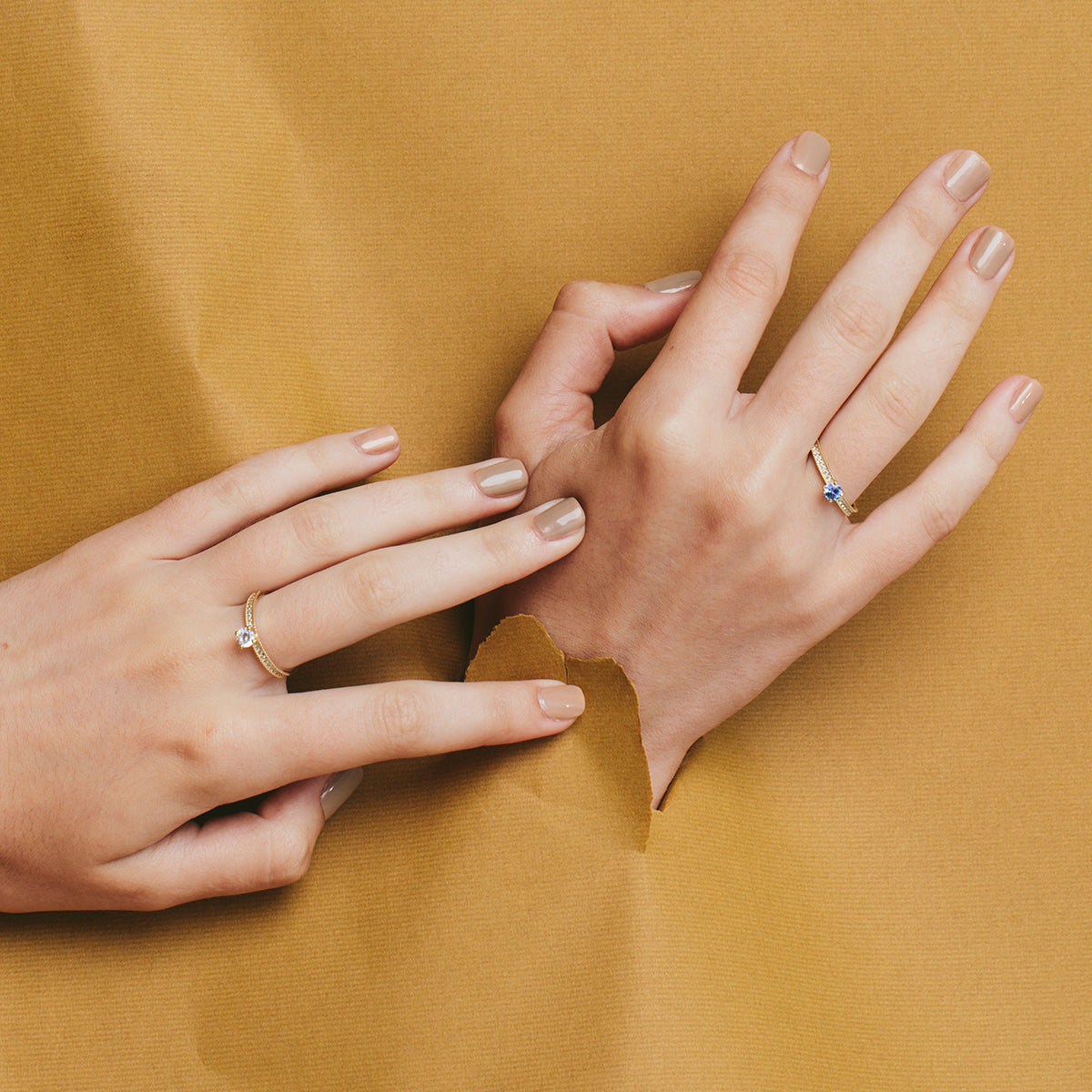 A special solitaire gold ring studded with sapphires