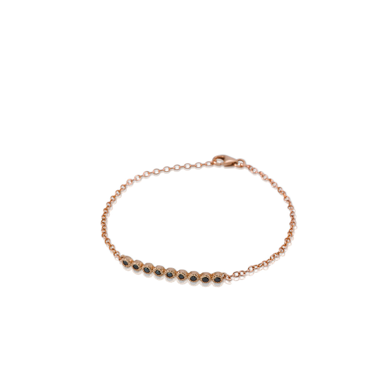 Gold bracelet set with 9 black diamonds