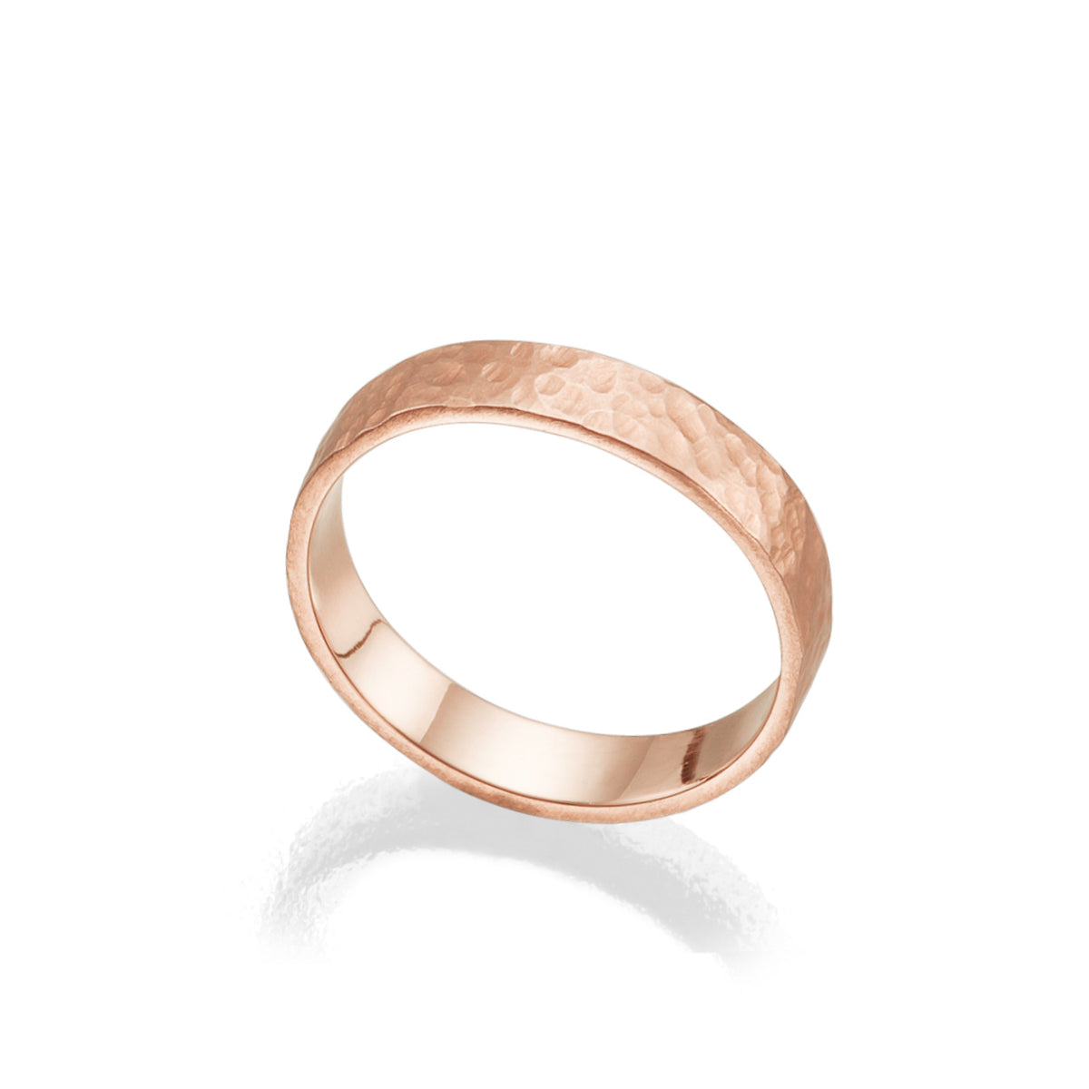 A wedding ring for a man and a woman: a flat gold ring with a fine braided texture, 4 mm wide